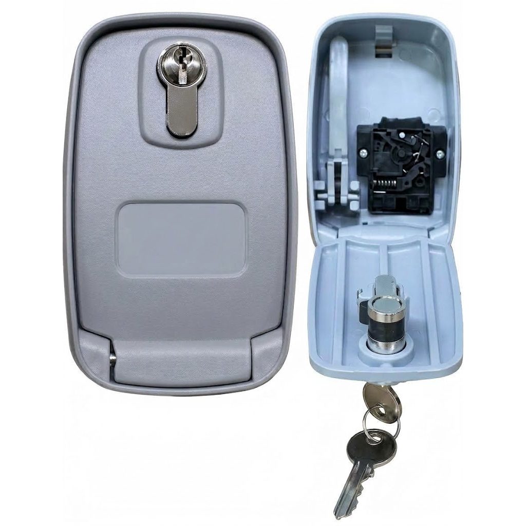 Open release box with the brake lever inside and the key in the lock
